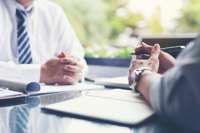 Sell-Side Mergers & Acquisitions Advisor Consulting Business Owner On Their Future Exit