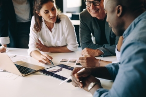 Business People Fixing Closing Complexity with Purchase Agreement Negotiation