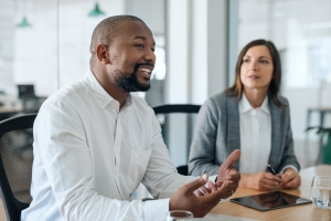 Buyer Negotiating with Business Owners to Protect Value